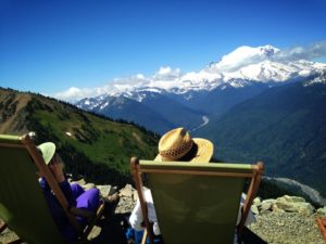 Couple sitting in Crystal Mountain Slingback Chairs