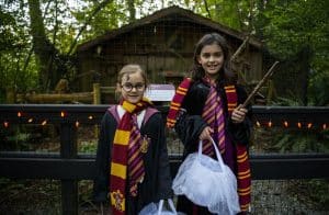 two kids dressed as harry potter witches